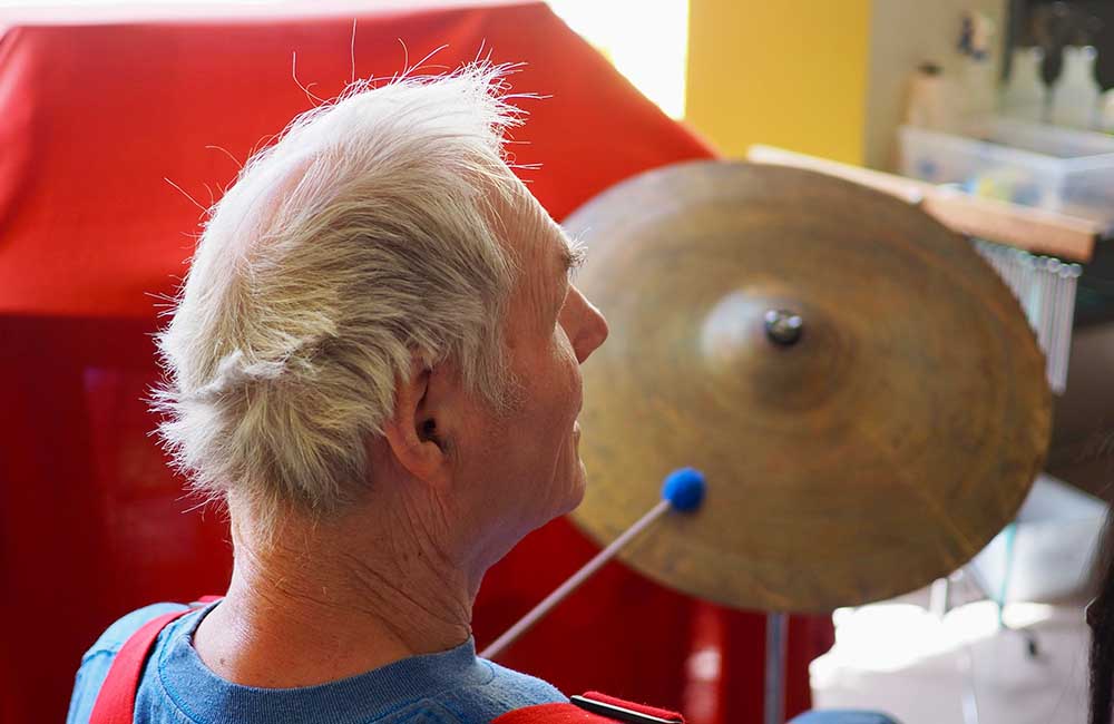 man playing the drum set