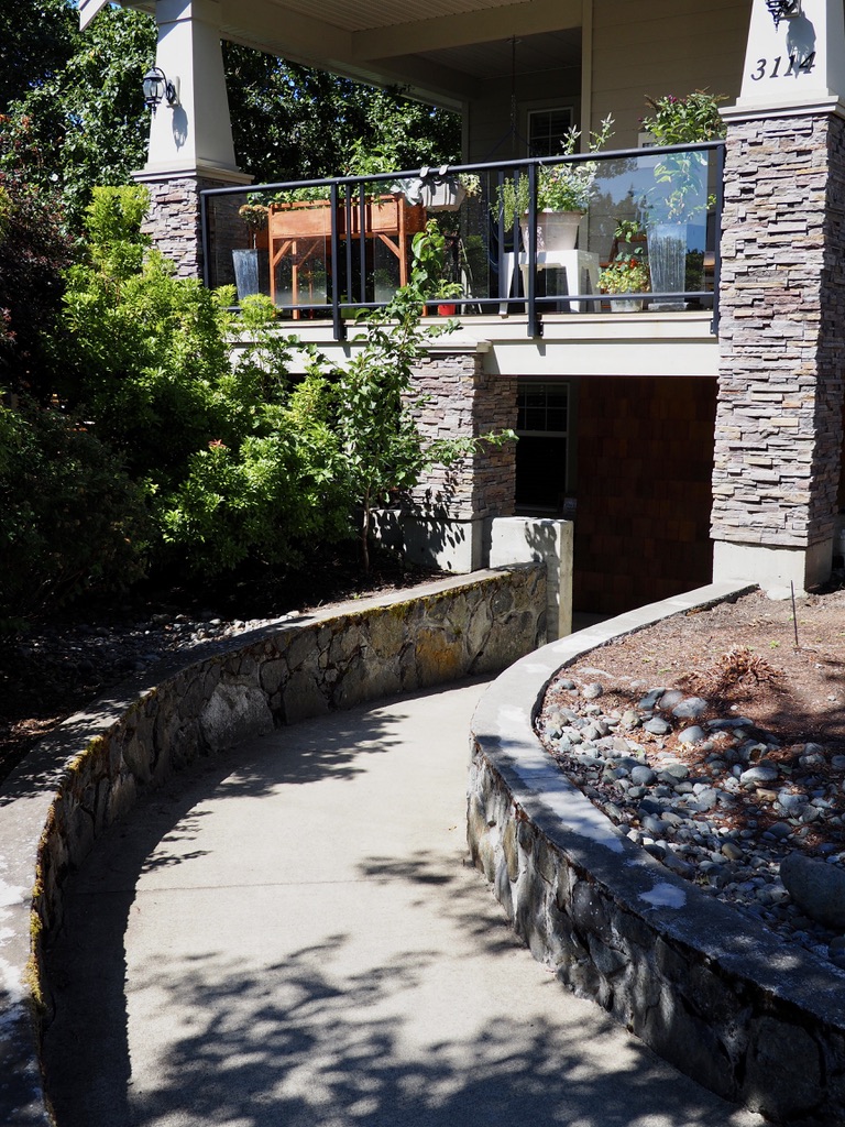 walkway with stone wall