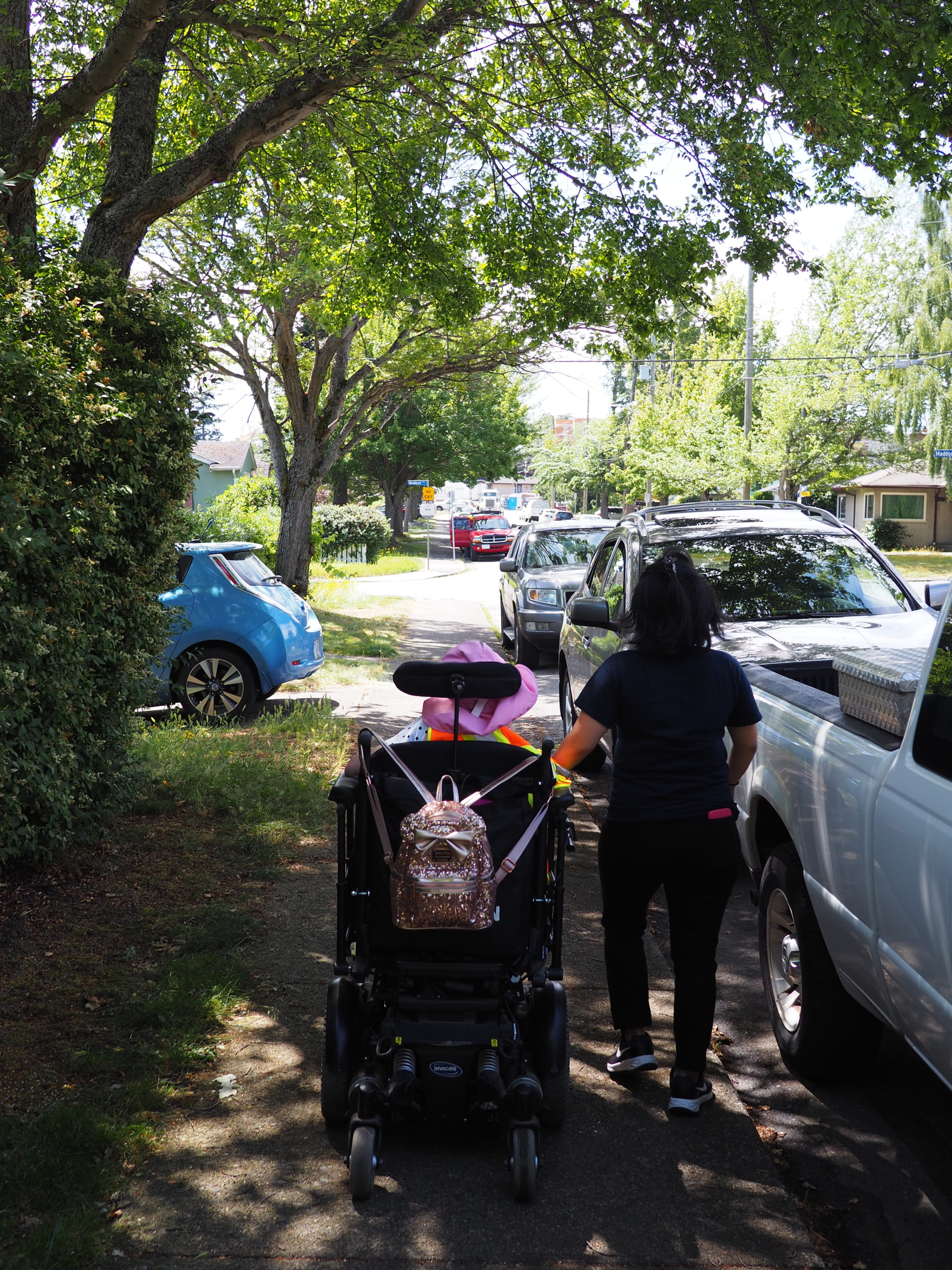 going for a walk on a leafy street